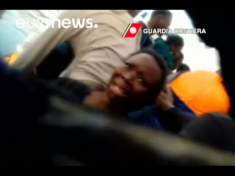 italian coastguard saves terrified migrants