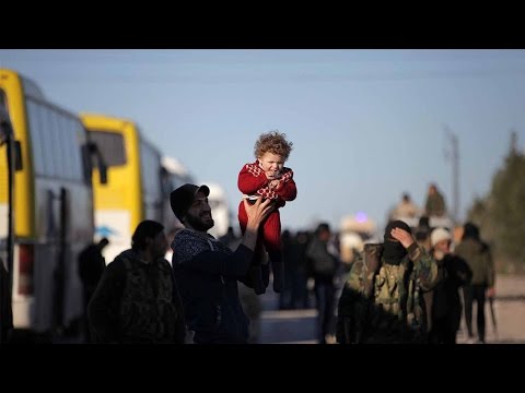 fighters and families evacuated from homs