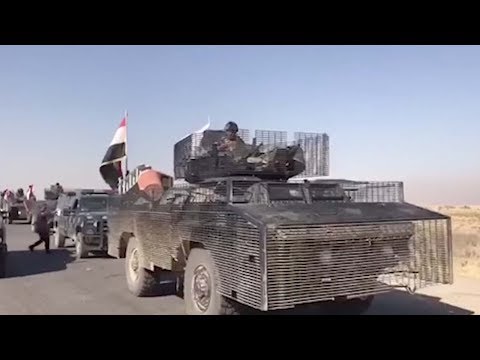 iraqi forces battle kurdish peshmerga fighters