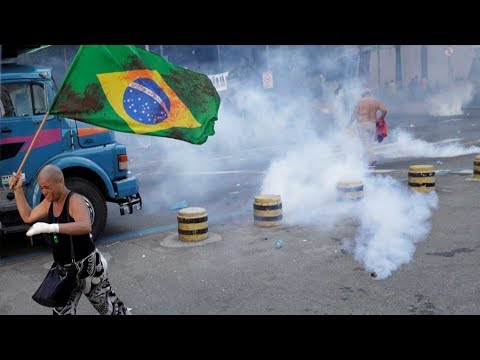 protesters clash with police as rio votes