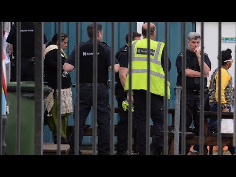 68 migrants found locked in containers at uk port