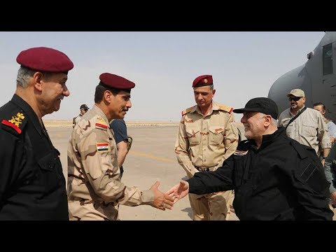 iraqi pm announces liberation of mosul