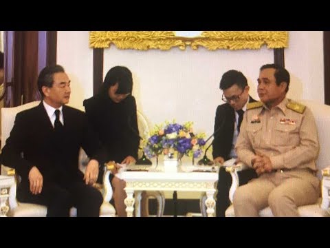 chinese fm wang yi meets thai pm