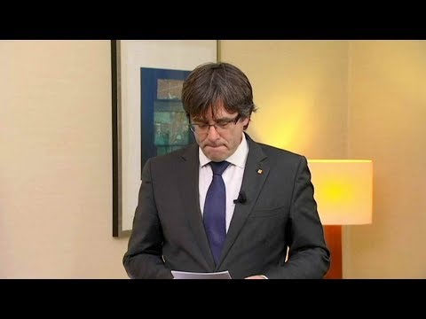 catalan leader carles puigdemont surrenders