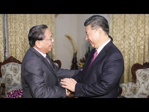 meets former president of laos